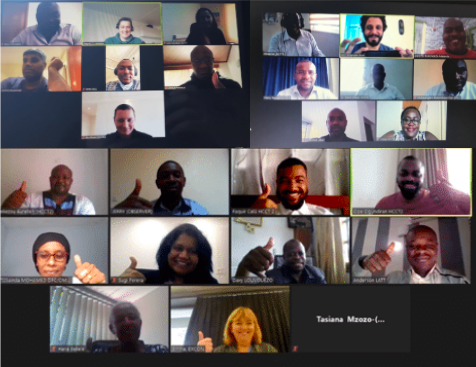 screenshot of multiple groups of people on Zoom teleconferencing platform